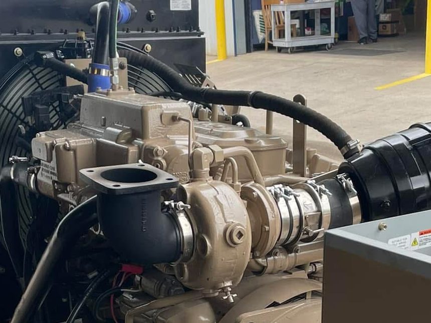 KilAire shutdown valve clamped into a genset air intake between the air cleaner and turbocharger inlet