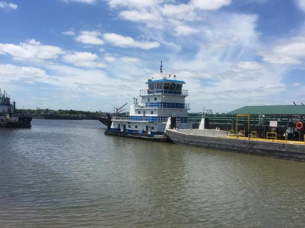 Towboat Captain Brantley alongside a barge