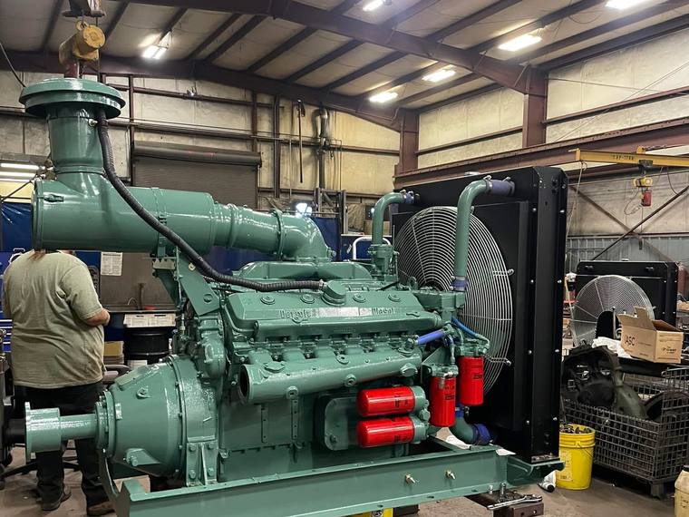 Detroit Diesel genset on a fabricated skid, built and painted in the shop.